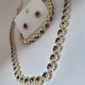 It's a 3-piece set, made of gold-plated material that is sweat, chlorine, and wa